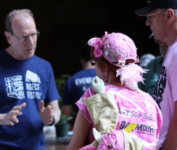 Bruce Tabashnik speaks with community members at the Arizona Insect Festival